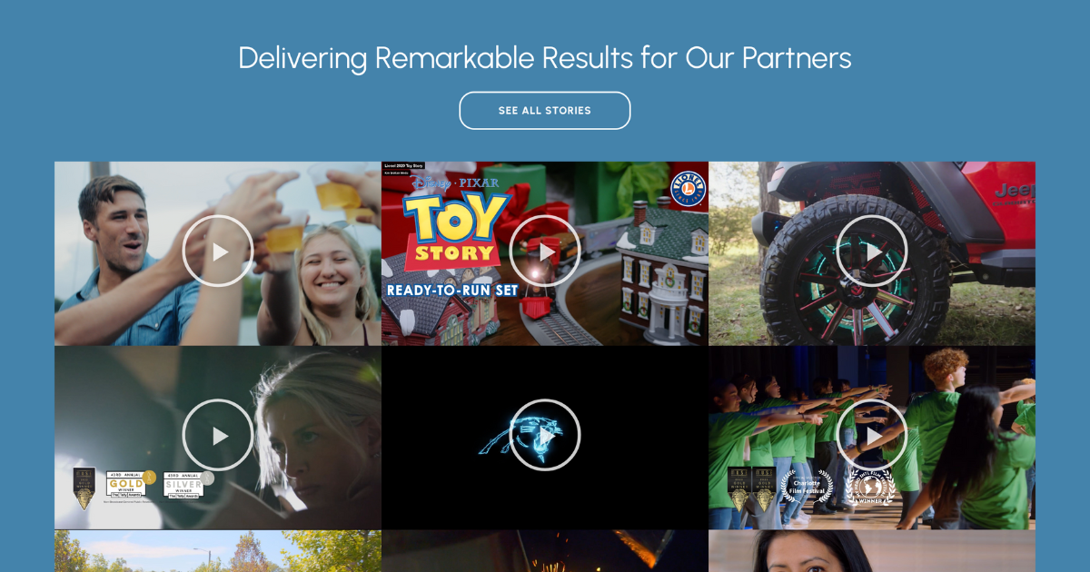 Webpage section titled 'Delivering Remarkable Results for Our Partners' features a grid of video thumbnails showcasing diverse projects. Highlights include joyful moments between people, a Toy Story themed train set, innovative vehicle rims, intense cinematic scenes, and a group dance performance. Each thumbnail includes a play button, inviting viewers to explore the success stories. Awards such as 'Best of Show' and 'Gold and Silver Awards' are subtly displayed, underscoring the achievements and quality of work produced. This layout is designed to engage visitors and highlight the creative versatility and recognition of the projects undertaken.